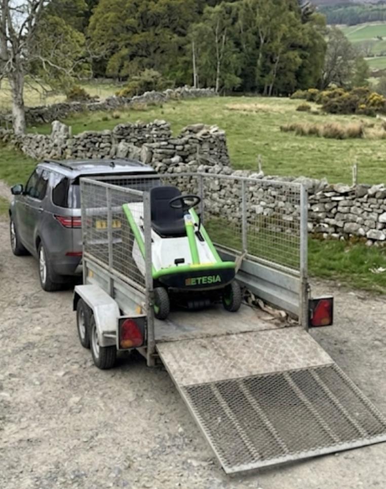 Etesia ride-on mower loaded on a trailer